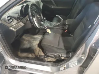 2012 Mazda 3 i Touring with VIN JM1BL1L8XC1605598, listed as a Copart auction lot 57154255 with 94,076 mi miles and Salvage title. Bid and sale history available at DreamBid. Image 7.