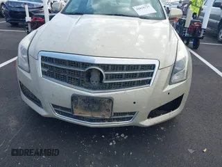 2014 Cadillac ATS Luxury AWD with VIN 1G6AH5RX6E0155382, listed as a IAAI auction lot 42025727 with 104,862 mi miles and . Bid and sale history available at carsss.com. Image 12.