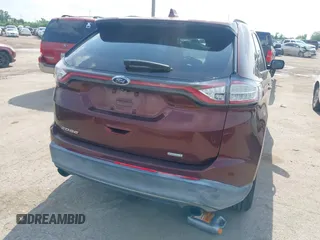 2015 Ford Edge SEL with VIN 2FMPK3J96FBC26148, listed as a IAAI auction lot 42096085 with 164,385 mi miles. Bid and sale history available at carsss.com. Image 4.