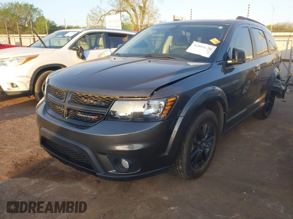 2019 Dodge Journey SE z VIN 3C4PDCBB8KT858387, wystawiony jako IAAI lot #42051620 z przebiegiem 76 126 mil mil oraz . Historia ofert i sprzedaży dostępna na DreamBid. Obrazek 17.