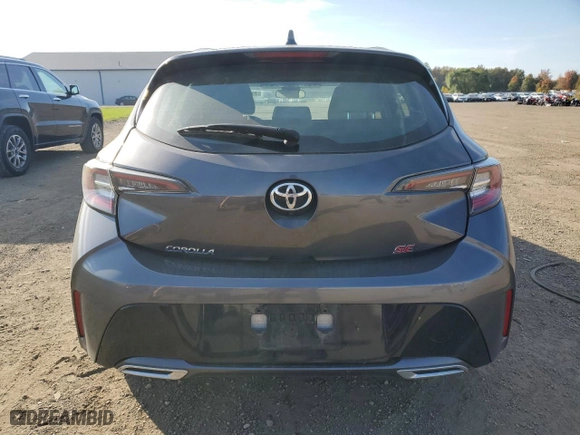 2022 Toyota Corolla Hatchback SE with VIN JTND4MBE1N3158709, listed as a Copart auction lot 77452694 with 74,299 mi miles and Salvage Title. Bid and sale history available at carsss.com. Image 6.