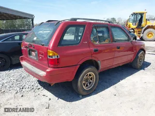 1999 Isuzu Rodeo S with VIN 4S2CM58W1X4356519, listed as a IAAI auction lot 41693480 with 225,839 mi miles. Bid and sale history available at carsss.com. Image 4.