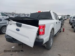 2019 Ford F-150 XL with VIN 1FTEW1C56KKF04321, listed as a IAAI auction lot 41597391 with 93,126 mi miles and . Bid and sale history available at DreamBid. Image 4.