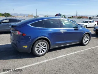 2018 Tesla Model X 75D with VIN 5YJXCBE22JF111938, listed as a Copart auction lot 47000303 with 63,430 mi miles. Bid and sale history available at carsss.com. Image 3.