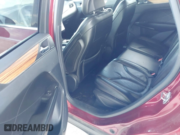 2016 Lincoln MKC Select with VIN 5LMCJ2C98GUJ19751, listed as a IAAI auction lot 42343559 with 88,745 mi miles and . Bid and sale history available at DreamBid. Image 8.