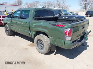 2022 Toyota Tacoma SR with VIN 3TMCZ5AN0NM470396, listed as a IAAI auction lot 41909515 with 35,997 mi miles and . Bid and sale history available at DreamBid. Image 3.