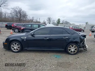 2011 Cadillac STS RWD z VIN 1G6DW6ED8B0159384, wystawiony jako IAAI lot #41840796 z przebiegiem 209 953 mil mil oraz . Historia ofert i sprzedaży dostępna na DreamBid. Obrazek 15.