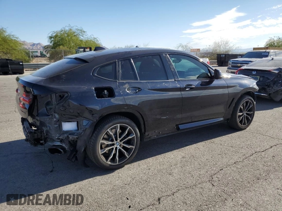 2021 BMW X4 M40i with VIN 5UX2V5C06M9E04443, listed as a Copart auction lot 72061194 with 71,637 mi miles and Salvage title. Bid and sale history available at DreamBid. Image 3.