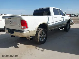 2014 Ram 2500 Longhorn with VIN 3C6UR5GLXEG244401, listed as a IAAI auction lot 41779709 with 180,760 mi miles. Bid and sale history available at carsss.com. Image 4.