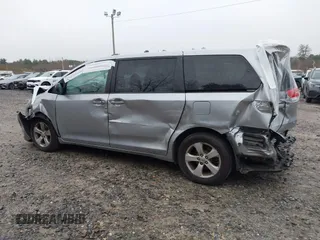 2012 Toyota Sienna with VIN 5TDKA3DC7CS015592, listed as a IAAI auction lot 40839775 with 161,944 mi miles and . Bid and sale history available at DreamBid. Image 3.