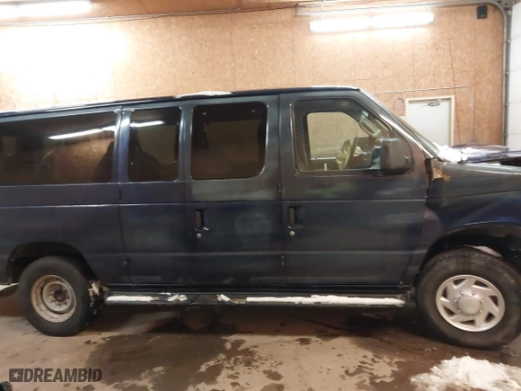 2012 Ford Econoline Wagon XL with VIN 1FBSS3BL8CDA76742, listed as a IAAI auction lot 41168179 with 250,991 mi miles. Bid and sale history available at carsss.com. Image 14.