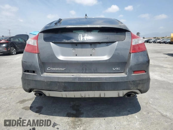 2013 Honda Crosstour EX-L z VIN 5J6TF1H59DL002040, wystawiony jako Copart lot #53917545 z przebiegiem 183 093 mil mil oraz Szkody całkowita. Historia ofert i sprzedaży dostępna na DreamBid. Obrazek 6.