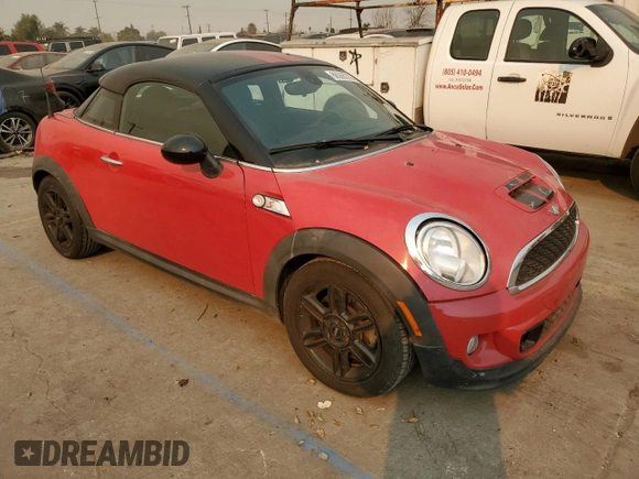 2012 MINI Coupe S z VIN WMWSX3C57CT155013, wystawiony jako Copart lot #88066275 z przebiegiem 69 870 mil mil oraz Szkody całkowita. Historia ofert i sprzedaży dostępna na DreamBid. Obrazek 4.