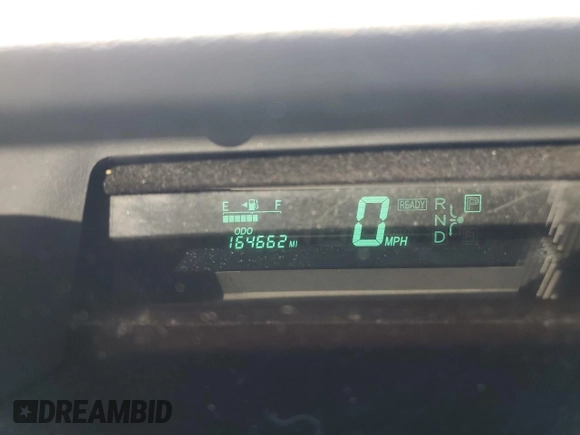 2004 Toyota Prius with VIN JTDKB20U240047067, listed as a Copart auction lot 56230125 with 164,662 mi miles and Salvage Title. Bid and sale history available at DreamBid. Image 9.