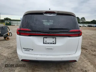 2023 Chrysler Pacifica Touring L z VIN 2C4RC1BG3PR512916, wystawiony jako Copart lot #61049575 z przebiegiem 38 642 mil mil oraz Szkoda całkowita • Salvage title. Historia ofert i sprzedaży dostępna na DreamBid. Obrazek 6.