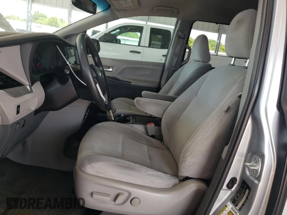 2015 Toyota Sienna LE AAS with VIN 5TDKK3DC5FS663627, listed as a Copart auction lot 59930455 with 125,858 mi miles and Salvage title. Bid and sale history available at DreamBid. Image 7.
