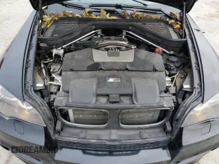 2014 BMW X6 M with VIN 5YMGZ0C56E0C40490, listed as a Copart auction lot 85317174 with 104,630 mi miles and Salvage Title. Bid and sale history available at carsss.com. Image 12.