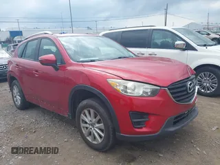 2016 Mazda CX-5 Sport with VIN JM3KE4BY3G0635882, listed as a IAAI auction lot 42545799 with 144,247 mi miles and . Bid and sale history available at DreamBid. Image 1.