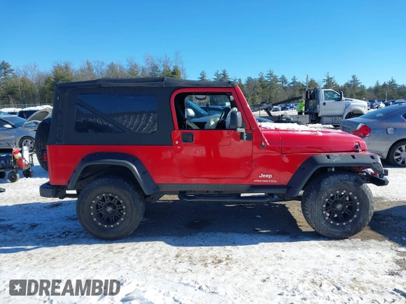 2005 Jeep Wrangler Unlimited with VIN 1J4FA44S05P375941, listed as a IAAI auction lot 41420299 with 138,859 mi miles. Bid and sale history available at carsss.com. Image 13.