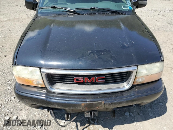 2003 GMC Sonoma SLS z VIN 1GTCT19X738236077, wystawiony jako Copart lot #68765694 z przebiegiem 224 623 mil mil oraz Nie do naprawy • Non repairable. Historia ofert i sprzedaży dostępna na DreamBid. Obrazek 11.