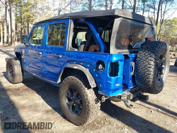 2021 Jeep Wrangler Unlimited Sport S with VIN 1C4HJXDG1MW722743, listed as a IAAI auction lot 41237900 with 35,662 mi miles and . Bid and sale history available at DreamBid. Image 3.