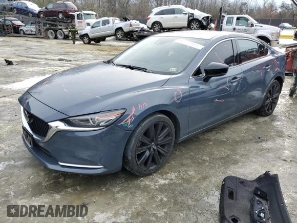 2021 Mazda 6 Carbon Edition with VIN JM1GL1WY9M1616420, listed as a Copart auction lot 41511095 with 50,236 mi miles and Salvage Title. Bid and sale history available at DreamBid. Image 1.