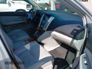 2007 Lexus RX 350 with VIN 2T2HK31U37C028032, listed as a IAAI auction lot 42117631 with 142,430 mi miles. Bid and sale history available at carsss.com. Image 5.