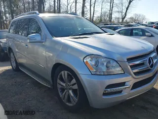 2011 Mercedes-Benz GL-Class GL 450 with VIN 4JGBF7BE1BA660453, listed as a IAAI auction lot 41852431 with 143,084 mi miles. Bid and sale history available at carsss.com. Image 1.