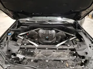 2021 BMW X6 M50i with VIN 5UXCY8C05M9E21862, listed as a Copart auction lot 86329064 with 0 mi miles and Salvage Title. Bid and sale history available at carsss.com. Image 14.
