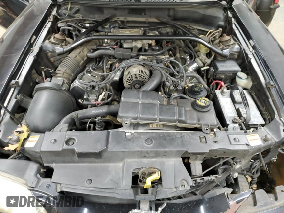 1997 Ford Mustang GT with VIN 1FALP42X4VF192088, listed as a Copart auction lot 84714114 with 194,845 mi miles and Salvage title. Bid and sale history available at DreamBid. Image 11.