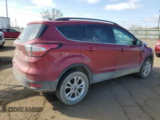 2018 Ford Escape SE z VIN 1FMCU9GD0JUC29279, wystawiony jako Copart lot #54511595 z przebiegiem 77 547 mil mil oraz Czysty tytuł • Clean title. Historia ofert i sprzedaży dostępna na DreamBid. Obrazek 3.