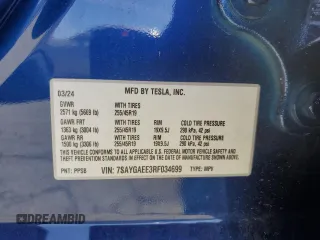 2024 Tesla Model Y Long Range z VIN 7SAYGAEE3RF034699, wystawiony jako Copart lot #54523815 z przebiegiem 9 764 mil mil oraz Szkoda całkowita • Salvage title. Historia ofert i sprzedaży dostępna na DreamBid. Obrazek 13.
