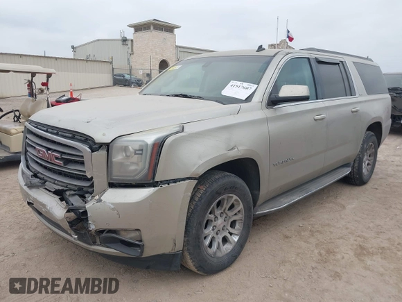 2015 GMC Yukon XL SLE z VIN 1GKS1GKC1FR155056, wystawiony jako IAAI lot #41517607 z przebiegiem 174 634 mil mil oraz . Historia ofert i sprzedaży dostępna na DreamBid. Obrazek 17.