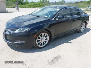 2016 Lincoln MKZ z VIN 3LN6L2J93GR632474, wystawiony jako IAAI lot #42607060 z przebiegiem 99 490 mil mil oraz . Historia ofert i sprzedaży dostępna na DreamBid. Obrazek 2.