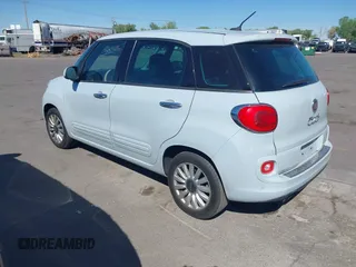 2014 FIAT 500L Easy with VIN ZFBCFABH9EZ010519, listed as a IAAI auction lot 42150633 with 60,724 mi miles. Bid and sale history available at carsss.com. Image 3.