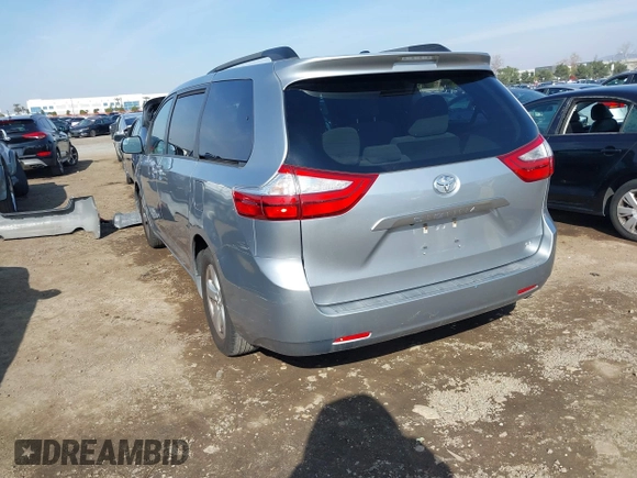 2016 Toyota Sienna LE AAS with VIN 5TDKK3DC2GS750211, listed as a IAAI auction lot 41444073 with 120,185 mi miles and . Bid and sale history available at DreamBid. Image 3.
