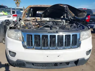 2011 Jeep Grand Cherokee Laredo with VIN 1J4RS4GG2BC618072, listed as a IAAI auction lot 38619850 with Not Provided miles and . Bid and sale history available at DreamBid. Image 11.