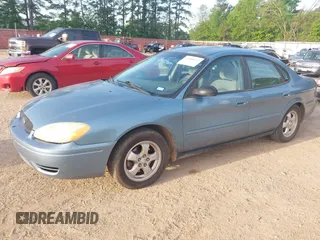 2006 Ford Taurus SE with VIN 1FAFP53U26A179541, listed as a IAAI auction lot 42000612 with 214,881 mi miles. Bid and sale history available at carsss.com. Image 2.