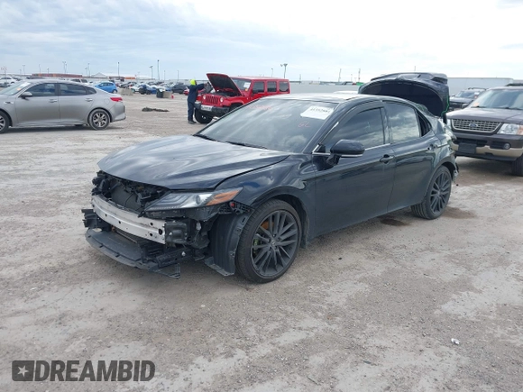 2022 Toyota Camry XSE z VIN 4T1K61AK2NU700840, wystawiony jako IAAI lot #41352884 z przebiegiem 98 634 mil mil oraz . Historia ofert i sprzedaży dostępna na DreamBid. Obrazek 18.