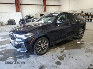 2023 BMW X6 xDrive40i z VIN 5UXCY6C05P9R93634, wystawiony jako Copart lot #45934185 z przebiegiem Nie podano mil oraz Szkody całkowita. Historia ofert i sprzedaży dostępna na DreamBid. Obrazek 1.