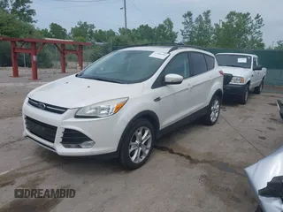 2013 Ford Escape SEL with VIN 1FMCU9H90DUC52981, listed as a IAAI auction lot 42506500 with 74,212 mi miles and . Bid and sale history available at DreamBid. Image 2.