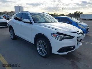 2018 Alfa Romeo Stelvio with VIN ZASFAKANXJ7B73800, listed as a IAAI auction lot 41028864 with 102,518 mi miles. Bid and sale history available at carsss.com. Image 1.