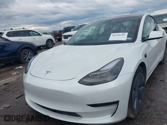2023 Tesla Model 3 z VIN 5YJ3E1EA0PF511158, wystawiony jako IAAI lot #42210455 z przebiegiem 22 291 mil mil oraz . Historia ofert i sprzedaży dostępna na DreamBid. Obrazek 2.