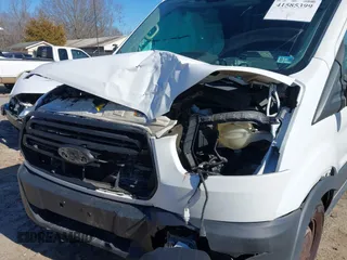 2019 Ford Transit with VIN 1FTYR2CM1KKB30444, listed as a IAAI auction lot 41585399 with 402,723 mi miles. Bid and sale history available at carsss.com. Image 6.