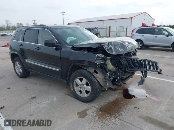 2011 Jeep Grand Cherokee Laredo z VIN 1J4RR4GG8BC504878, wystawiony jako IAAI lot #42097973 z przebiegiem 190 583 mil mil oraz . Historia ofert i sprzedaży dostępna na DreamBid. Obrazek 1.