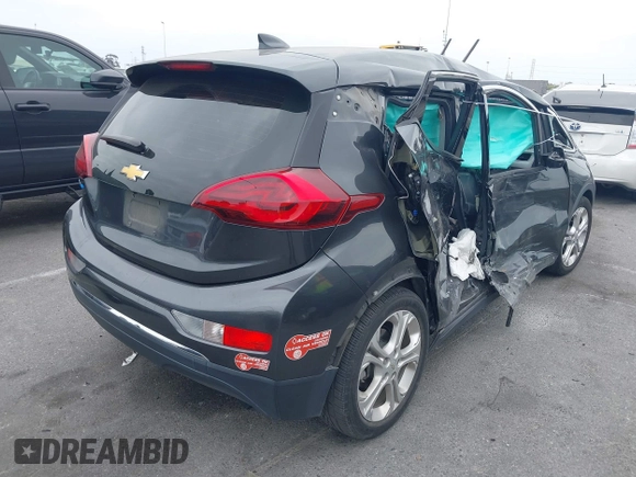 2018 Chevrolet Bolt EV LT with VIN 1G1FW6S02J4133385, listed as a IAAI auction lot 42380348 with 87,041 mi miles and . Bid and sale history available at DreamBid. Image 4.