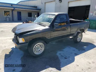 1992 Toyota Pickup z VIN JT4RN81A8N0104449, wystawiony jako Copart lot #49462795 z przebiegiem 189 796 mil mil oraz Szkoda całkowita • Salvage title. Historia ofert i sprzedaży dostępna na DreamBid. Obrazek 1.