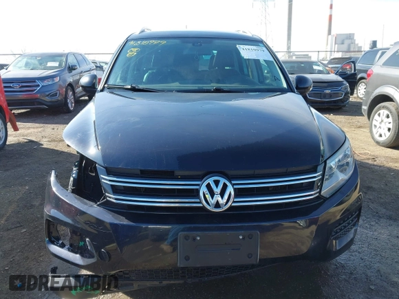 2017 Volkswagen Tiguan Wolfsburg Edition z VIN WVGSV7AXXHK007144, wystawiony jako IAAI lot #41810979 z przebiegiem 125 363 mil mil oraz . Historia ofert i sprzedaży dostępna na DreamBid. Obrazek 13.
