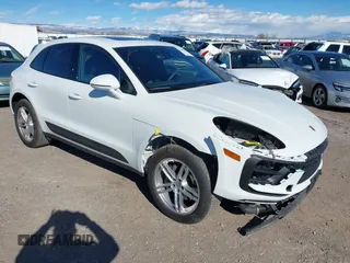 2024 Porsche Macan with VIN WP1AA2A52RLB16236, listed as a IAAI auction lot 41609431 with 8,235 mi miles and . Bid and sale history available at DreamBid. Image 1.