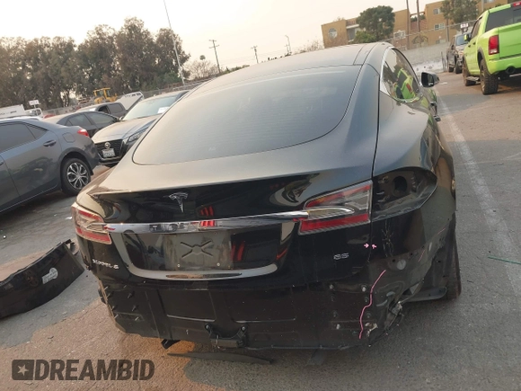 2013 Tesla Model S with VIN 5YJSA1CN3DFP06986, listed as a IAAI auction lot 41271801 with 150,307 mi miles and . Bid and sale history available at DreamBid. Image 16.